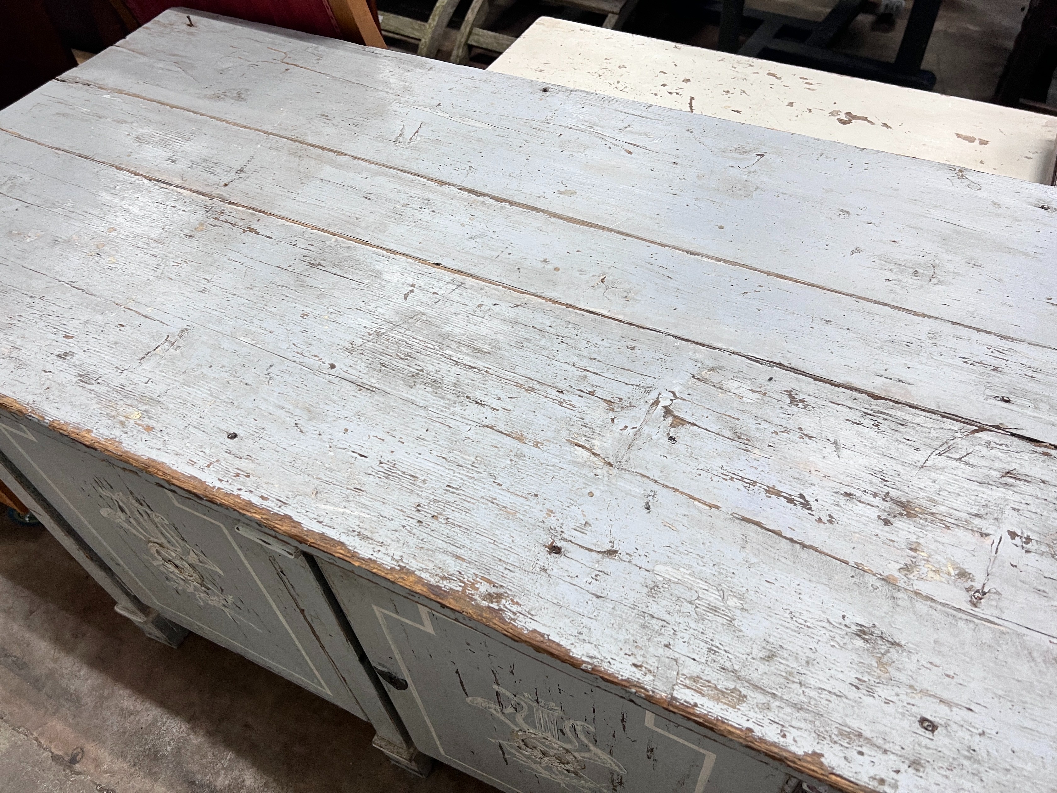 A continental painted pine low cupboard, width 125cm *Please note the sale commences at 9am.